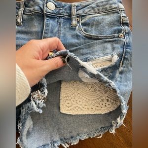 American Eagle Jean Shorts with Ivory Crochet Pockets